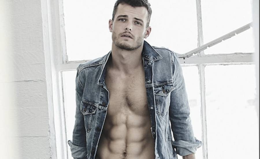 Michael Mealor showing his six pack