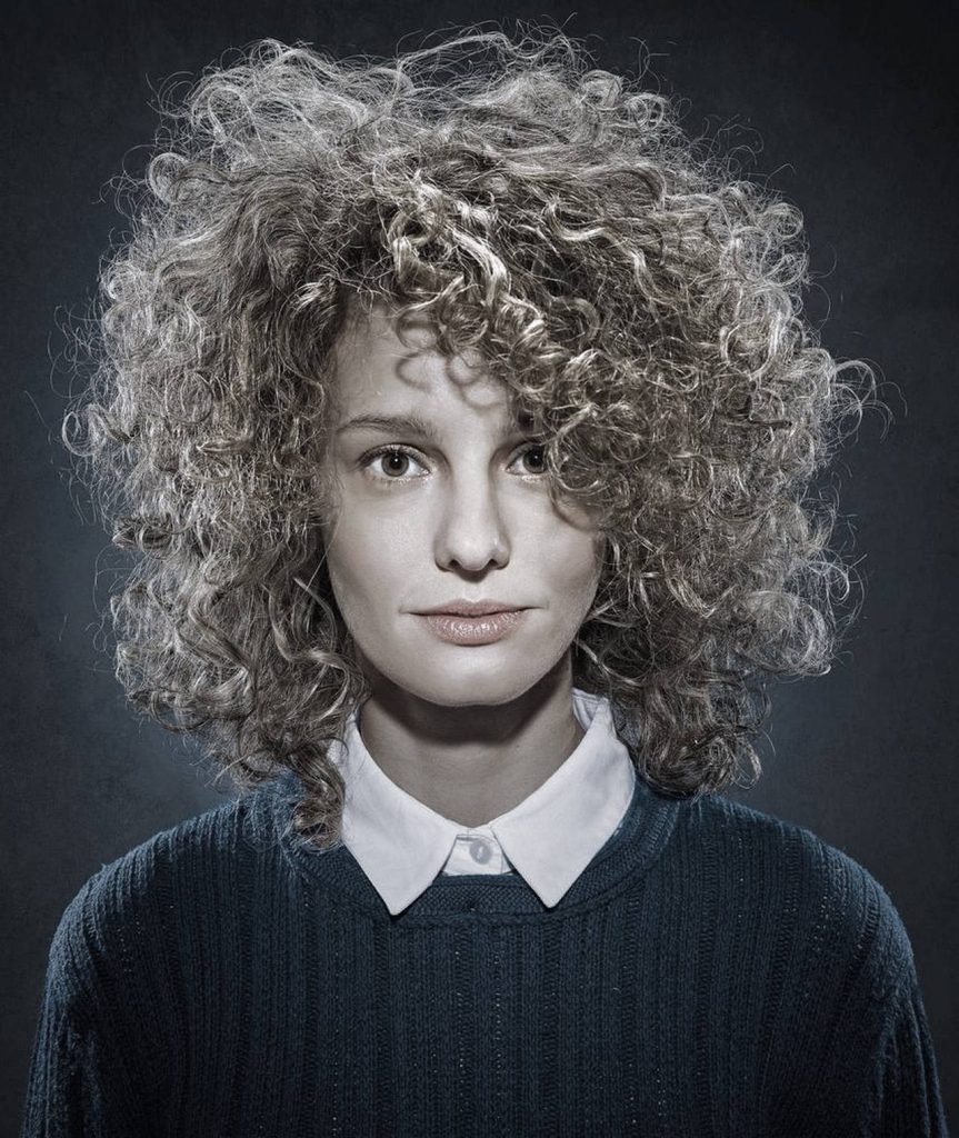 Esther Acebo's curly hair