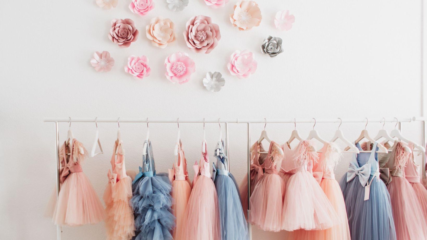 bright prom dresses on dress rack